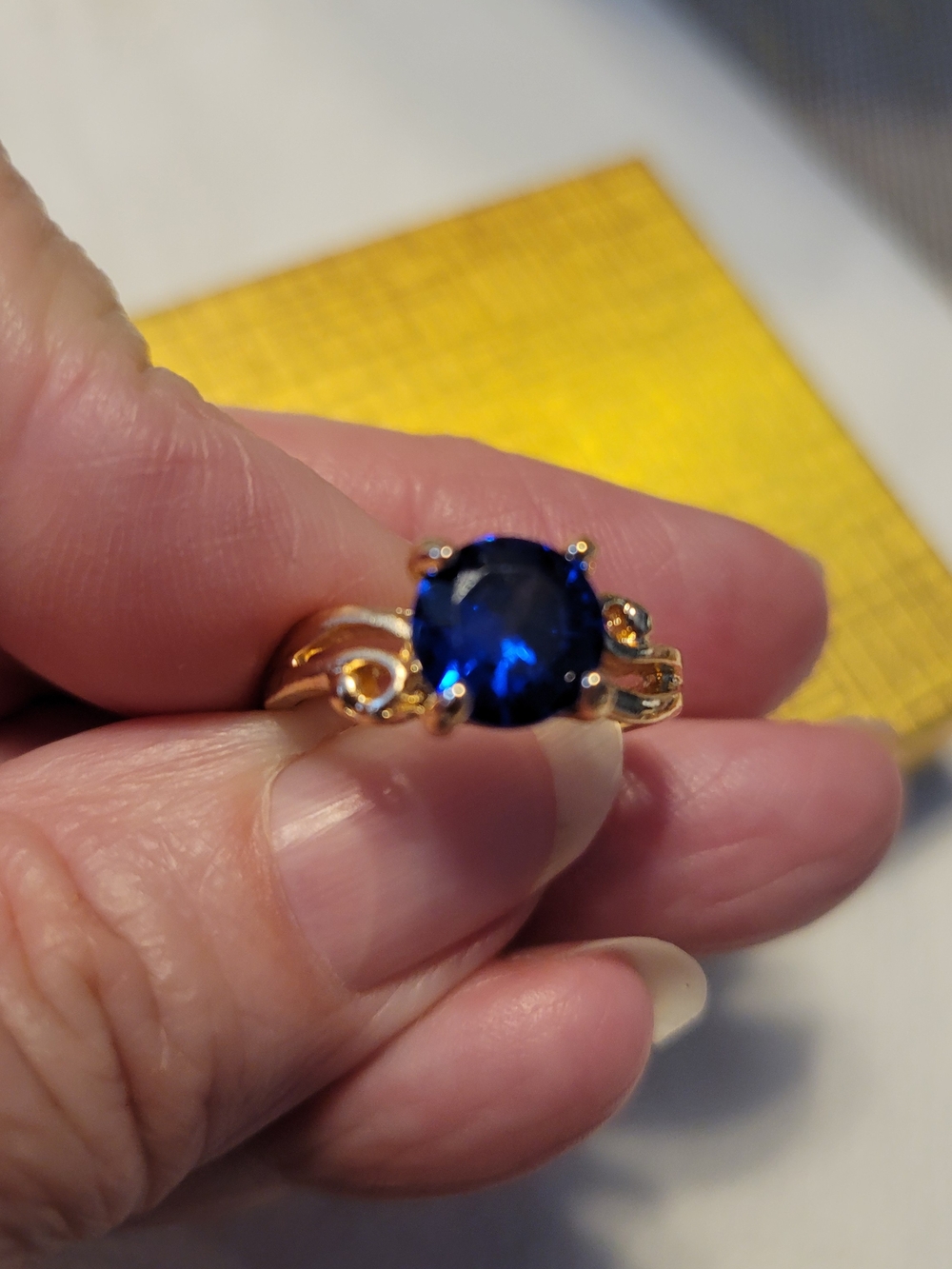 Goldtone Ring with Deep Blue Sapphire-Style Stone